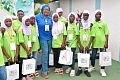 Hajia Memuna (arrowed) with some pupils after a free ICT training programme organised during their vacation.