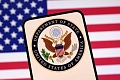United States Department of State logo and U.S. flag are seen in this illustration taken April 23, 2025. REUTERS/Dado Ruvic/Illustration