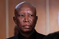 Julius Malema showed little emotion when he received news of the sentence