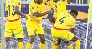 oseph Opoku (with hands raised) is joined by his teammates to celebrate Ghana's winning goal against the Central African Republic today