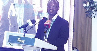 Prof. Gordon Abeka Nkrumah (right), lecturer, University of Ghana Business School, Legon, delivering the keynote address. Picture: ERNEST KODZI 