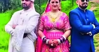 Pradeep (left) and Kapil Negi (right) with their bride, Sunita Chauhan (centre)