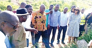 Officials being led on a tour of the Vea Irrigation Scheme