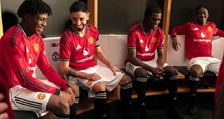Bruno Fernandes (2nd from left) and teammates model the new kit. Manchester United