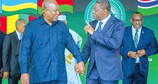President John Mahama (left) interacting with President Faure Gnassingbé of Togo