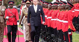 • King Willem-Alexander of The Netherlands reviews the honour guard after arriving to meet with William Ruto, Kenya's President, at State House in Nairobi, Kenya