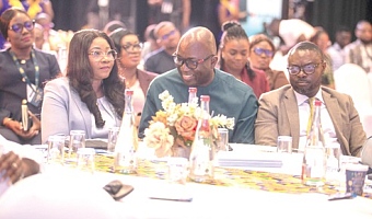 Shaibu Haruna (2nd from left), Chief Executive Officer of Mobile Money Limited, explaining a point to Matilda Asante-Asiedu (left), Second Deputy Governor of the Bank of Ghana, during the forum. Picture: DOUGLAS ANANE-FRIMPONG