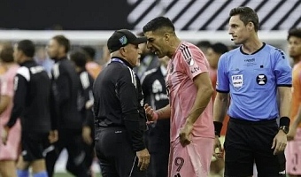 Luis Suarez banned for 6 matches for spitting at opposing coach