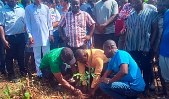 Dr Hanson Mensah-Akutteh (right), Chief Manager, Ashanti Production, GWL, together with Zachariah Mba (middle), DCE, Atwima Nwabiagya North, and Abraham Essel (left), District Manager, Forest Services Division, Nkawie, jointly planting a tree within a degraded portion of the Barekese dam forest cover