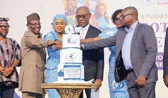 Kwasi Agyei (3rd from right), Controller and Accountant General, being assisted by Cynthia Amerley Amarteifio (2nd from right), Board Chairperson, Students Loan Trust Fund; Dr Emmanuel Newman (right), Director of Tertiary Education Division, Ministry of Education, and Dr Hajia Saajida Shiraz (3rd from left), Chief Executive Officer, Students Loan Trust Fund, to cut the cake to mark the 20th anniversary of the Students Loan Trust Fund. Picture: ELVIS NII NOI DOWUONA 