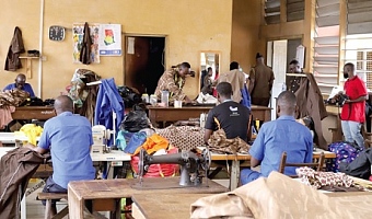 Some inmates at the tailoring shop