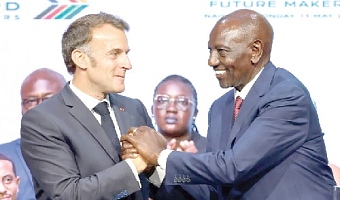President Emmanuel Macron and President William Ruto exchanging pleasantries at the Africa Forward Summit 2026 in Nairobi, Kenya