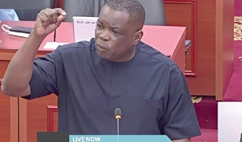 Kwame Gorverns Agbodza,  Minister of Roads and Highways, speaking in Parliament 