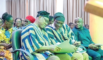Ziblim Alhassan Betintiche (right), Executive Director of the Ghana Library Authority (GhLA), interacting with Dr Clement Abas Apaak, Deputy Minister of Education and MP for Builsa South, during the event