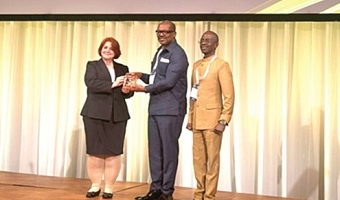 Brig. Gen. Paul Seidu Tanye-Kulono, DG, GPHA, receiving an award from IAPH official. With them is Johnson Asiedu Nketiah (right), Chairman, GPHA Board