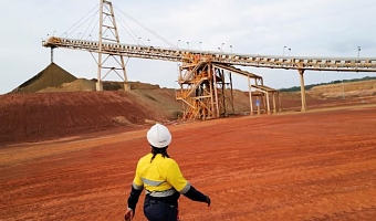 A mine worker walks near a conveyor belt as commercial gold production begins at the Newmont Ghana Gold Limited, Ahafo North Mine, in Afrisipakrom community in the Ahafo Region, Ghana. October 29, 2025. REUTERS/Francis Kokoroko/File Photo