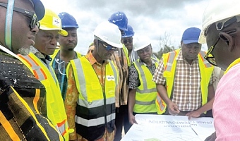 Project managers explaining a point to the GPHA/GSA delegation at Boankra