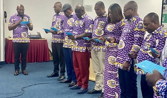 Mr Herbert Acquaye, Past President of the Ghana Hotels Association, administers the oath of office to Mr Victor Opoku Mintah and members of the newly elected executive team 