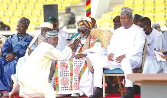 Sheikh Osman Nuhu Sharubutu (middle), National Chief Imam, praying for the nation during the Eid-ul-Adha celebration at the Black Star Square in Accra. With him is President John Dramani Mahama. Picture: ELVIS NII NOI DOWUONA