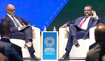 Dr Johnson Pandit Asiama (right), Governor, BoG, in a chat with Abebe Aemro Selassie, Director, African Department, IMF, during the Governor Talks forum