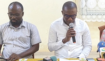 Dr Josephat A. Nyuzaghl (right), Upper West Regional Director of Health Services, addressing the media