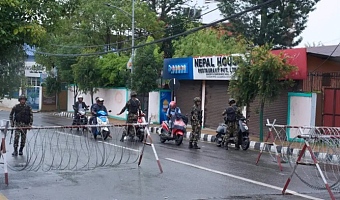Nepalese army personnel check and question civilians at a checkpoint in Kathmandu, Nepal, Wednesday, Sept. 10, 2025. (AP Photo/Niranjan Shrestha)