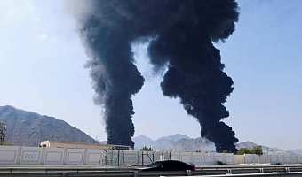Smoke rising from the Fujairah oil industry zone on 14 March, after an Iranian drone was intercepted above the port