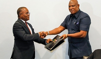 Ebenezer Ahumah Djietror (left), Clerk to Parliament, exchanging the signed MoU with Ato Afful, Managing Director, Graphic Communications Group Ltd. Picture: ELVIS NII NOI DOWUONA 