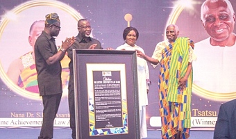 Vice-President Prof. Naana Jane Opoku-Agyemang (2nd from right) and Chief Justice Paul Baffoe-Bonnie (2nd from left) presenting a citation to Tsatsu Tsikata (right), Legal Practitioner. Applauding is Prof. Kofi Abotsi (left), Dean, UPSA Law School. Picture: ERNEST KODZI