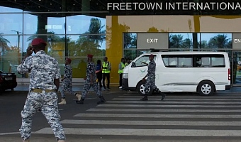 The deportees were escorted from Freetown International Airport in a white van