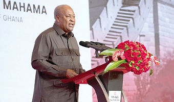 President John Mahama (inset) speaking at the Investment Forum in Beijing, China