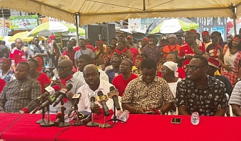 Ebenezer Marfo(Middle), Traffic Operations Officer of Metro Mass Transit, speaking at the event