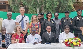 Dr Francis-Xavier Kojo Sosu (seated 2nd from right), Member of Parliament for the Madina Constituency, Adoboe Bright  Atawiah Kwami (4th from right), President of Freedom Aid Ghana, and others after the event