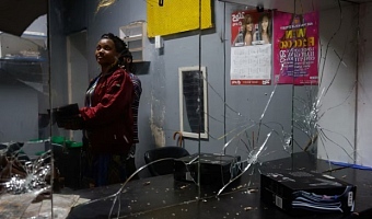 33-year-old Princess Adjei stands in her salon, which was destroyed in a xenophobic attack on May 18, in Durban, South Africa, June 9, 2026. REUTERS/Rogan Ward