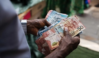 Bank of Ghana slashes cost of printing money by more than half as currency in circulation rises