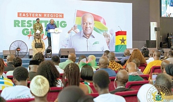 President John Dramani Mahama (arrowed), addressing  the gathering at a townhall meeting in Koforidua