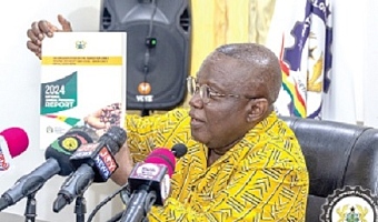 Dr Nii Moi Thompson launching the report