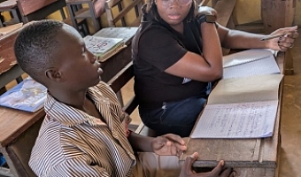 Our reporter, Efia Akese interacting with Kennedy Mensah Dogbe, a beneficiary of the ‘Camp Dream.Speak.Live’