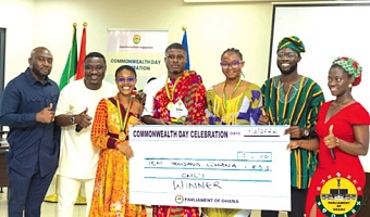 Titus Owusu Darko (4th from right), Precious Akos Agrobesa (3rd from right) and Dorothy Nkansah Agyapomaa (3rd from left), the three contestants joined by some of their colleagues to pose with the winning dummy