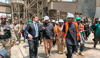 Mr Frederic Albrecht, Managing Director of CBI Ghana Ltd conducting President John Dramani Mahama and other dignataries round the plant