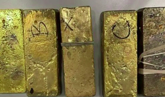 Officers discovered the gold bars on a man who was planning to fly abroad