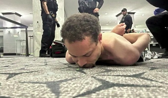 Law enforcement personnel arrested a suspect following the shooting at the White House Correspondents' Association dinner, in Washington, DC, US, April 25, 2026 [Handout/Donald J Trump on Truth Social via Reuters]