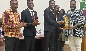 TEAM UPSA receiving their Prize after emerging winners of the Forest Day debate contest