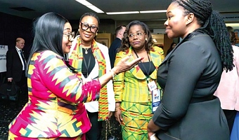  Lordina Dramani Mahama (left), First Lady, interacting with a participant