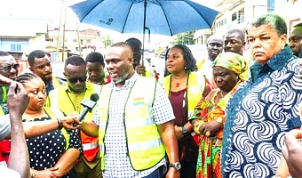 Kenneth Gilbert Adjei (middle), Minister of Works, Housing, and Water Resources, speaking to the media during the visit. With him are Gizella Tetteh-Agbotui (right), his deputy, and Theresa Lardi Awuni (left), MP for Okaikwei North Constituency 