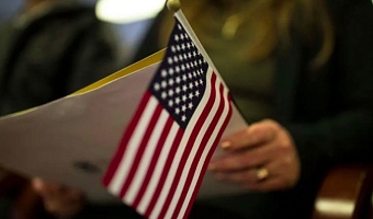 US tells foreigners seeking green cards: Return to your countries to apply