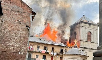 Lviv officials posted images of a residential building on fire next to the Bernardine monastery
