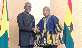Samuel Okudzeto Ablakwa (right), Minister of Foreign Affairs, in a handshake with Joseph Andall, the Grenada Minister of Foreign Affairs, Trade and Export Development, at the Political-Consultation meeting