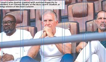 Black Stars head coach Carlos Queiroz (centre) with assistant Roger De Sa (right) and GFA  President, Kurt Simeon-Okraku at the Accra Sports Stadium as they observe a training session of the Black Galaxies