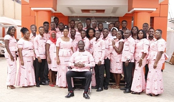 A group picture of staff in ALSALE’s branded cloth 